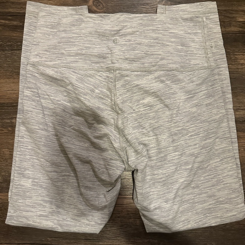 Size 8 White Stripes Lululemon barely used , mild piling